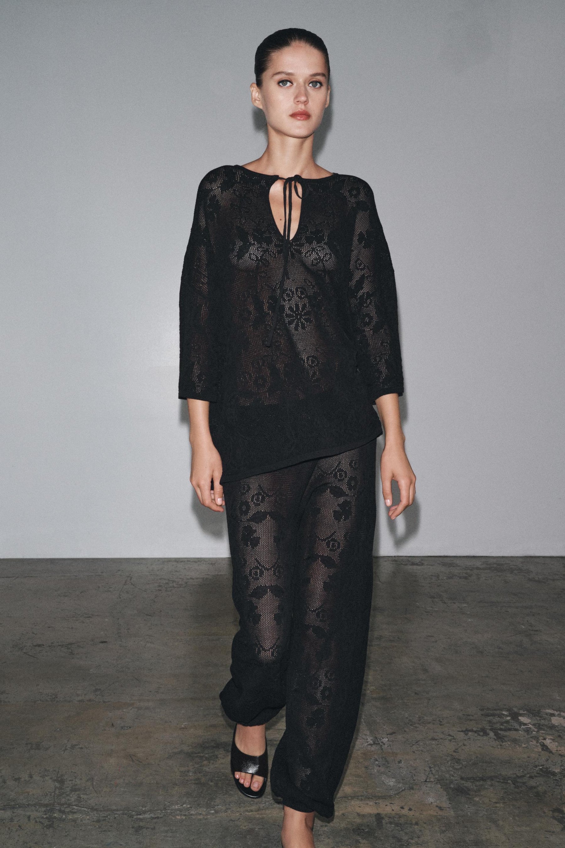 FLORAL STRUCTURE KNIT TROUSERS - Image 1