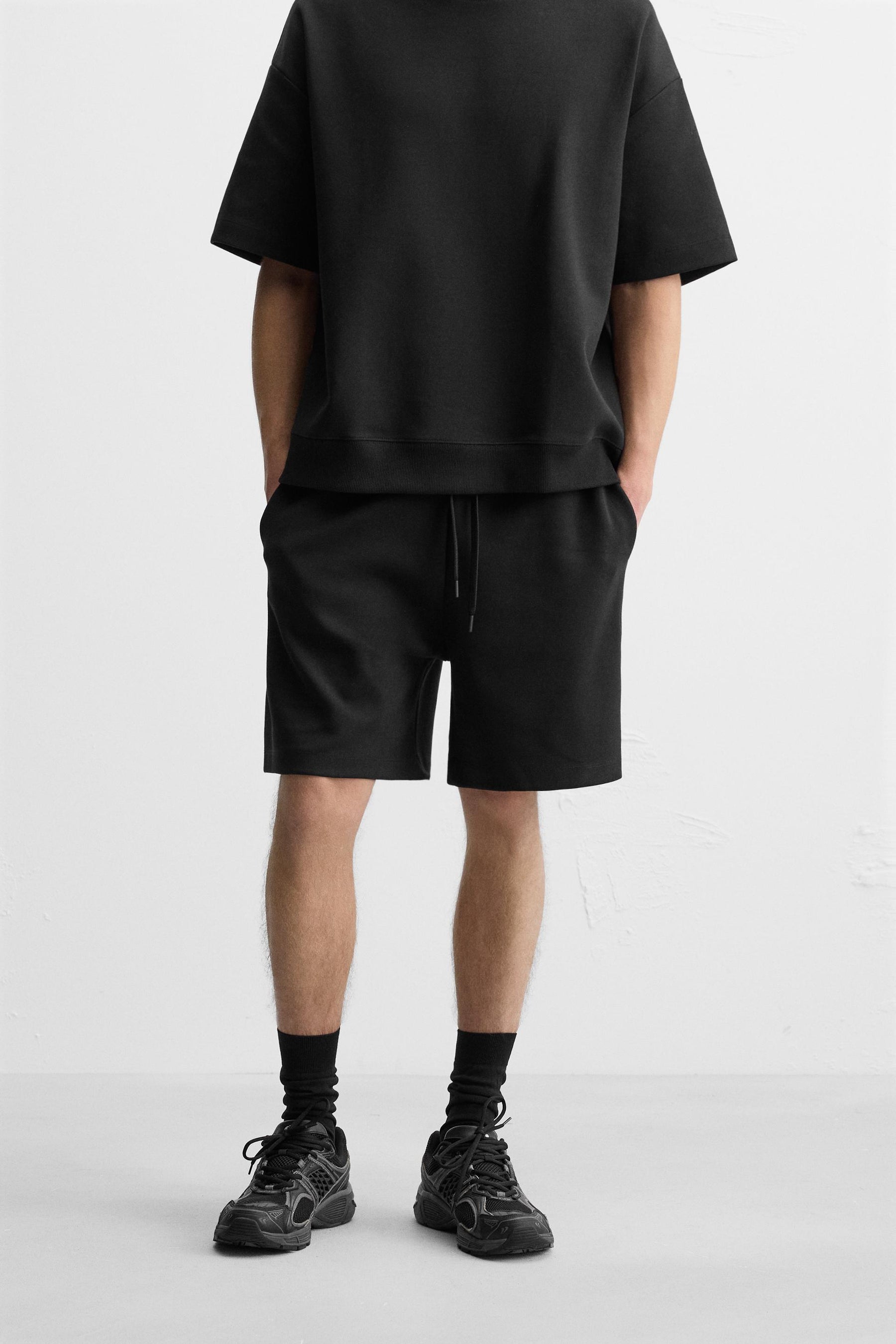 TECHNICAL INTERLOCK BERMUDA SHORTS - Image 2
