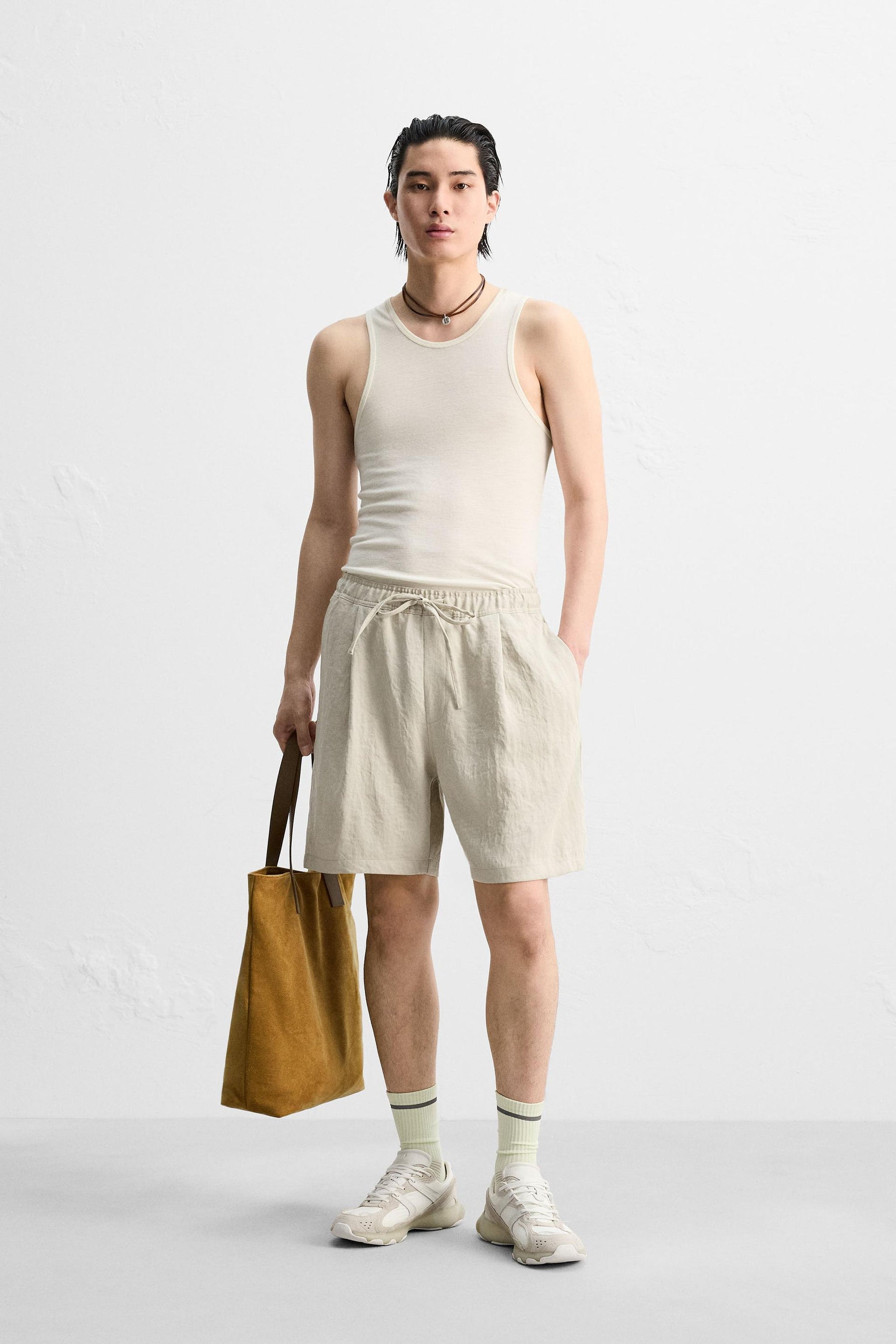 PLEATED FLOWING BERMUDA SHORTS - Image 1