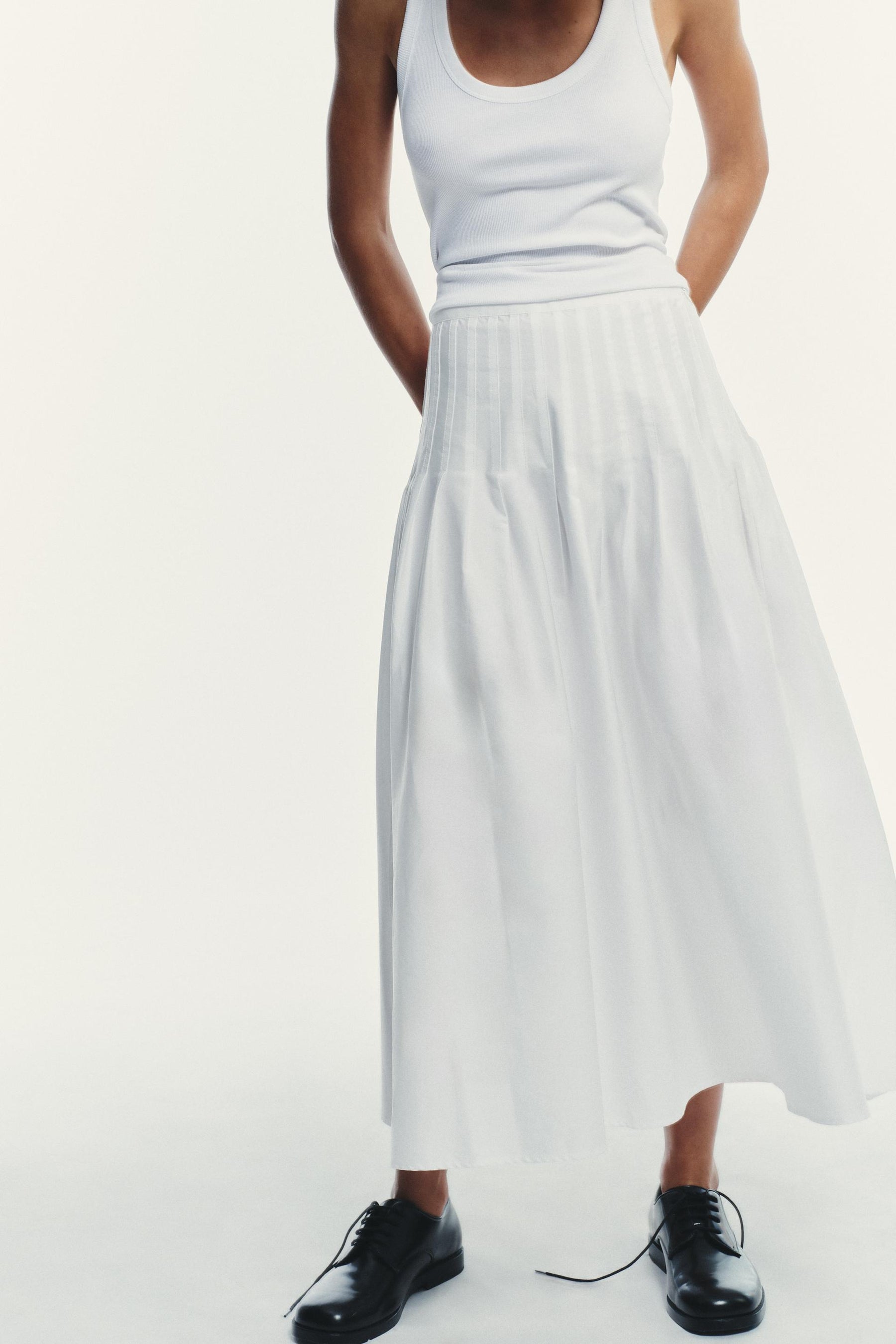 PLEATED MIDI SKIRT