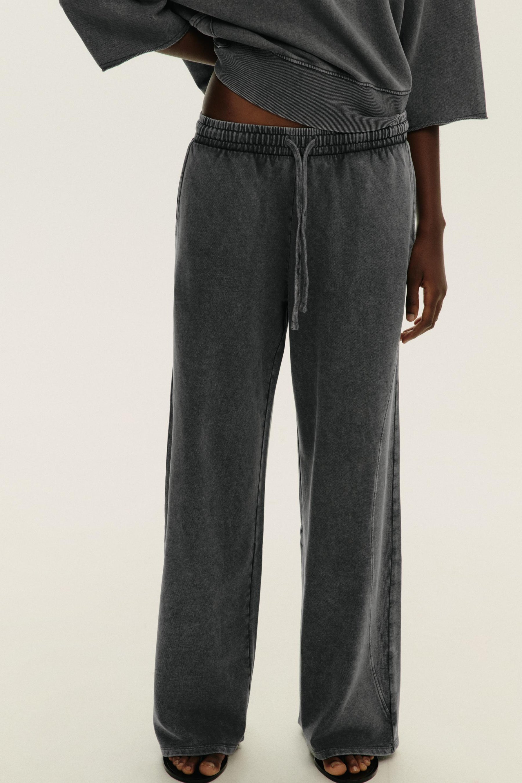 WASHED EFFECT TROUSERS