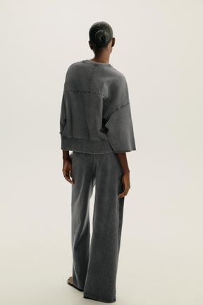 WASHED EFFECT TROUSERS