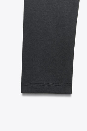 ASYMMETRIC LONG SLEEVE BODYSUIT