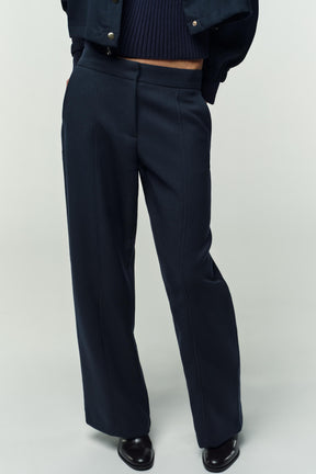 Straight-leg trousers with detail.