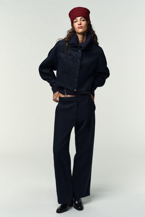 Straight-leg trousers with detail.