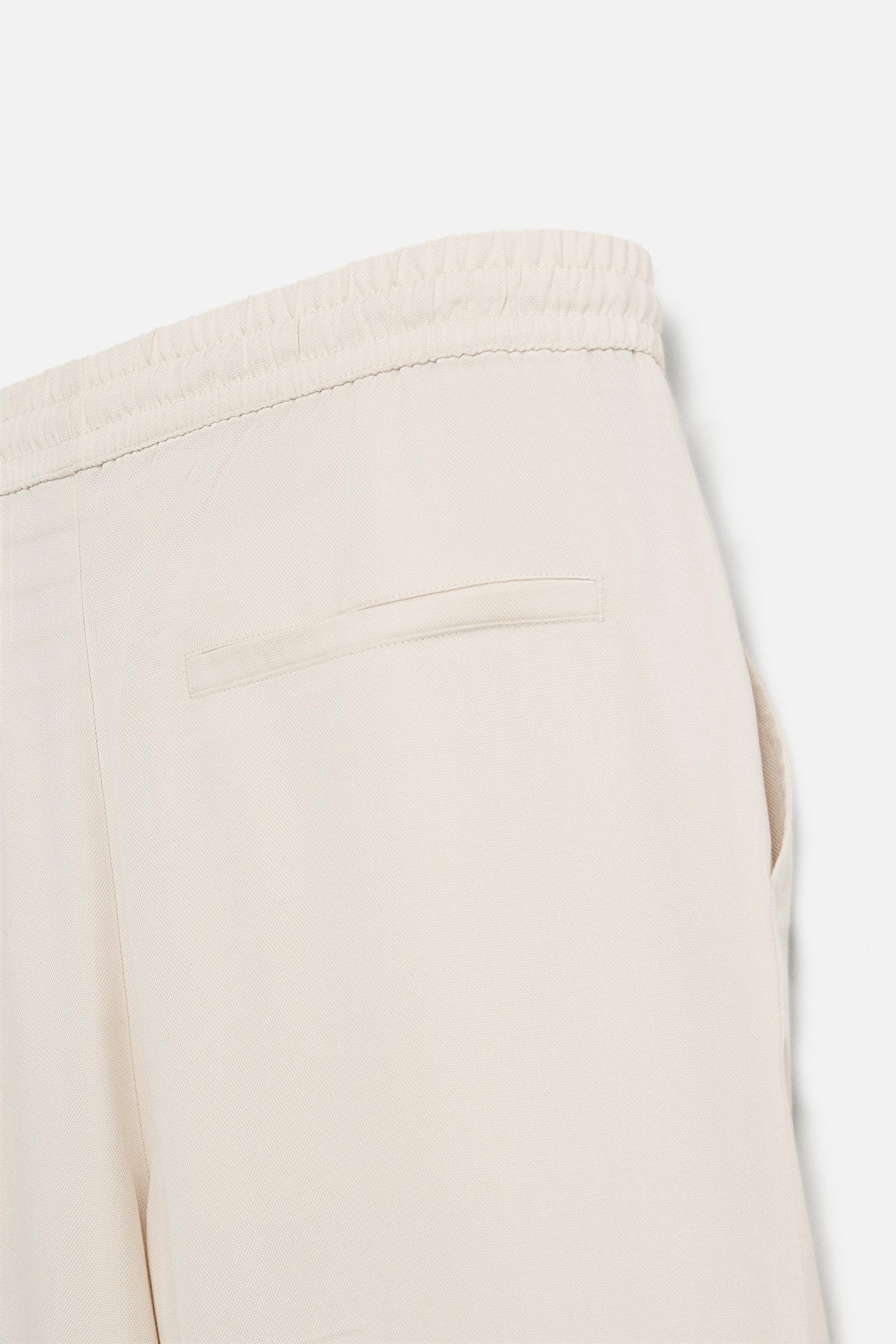 RELAXED FIT LYOCELL TROUSERS - Image 10