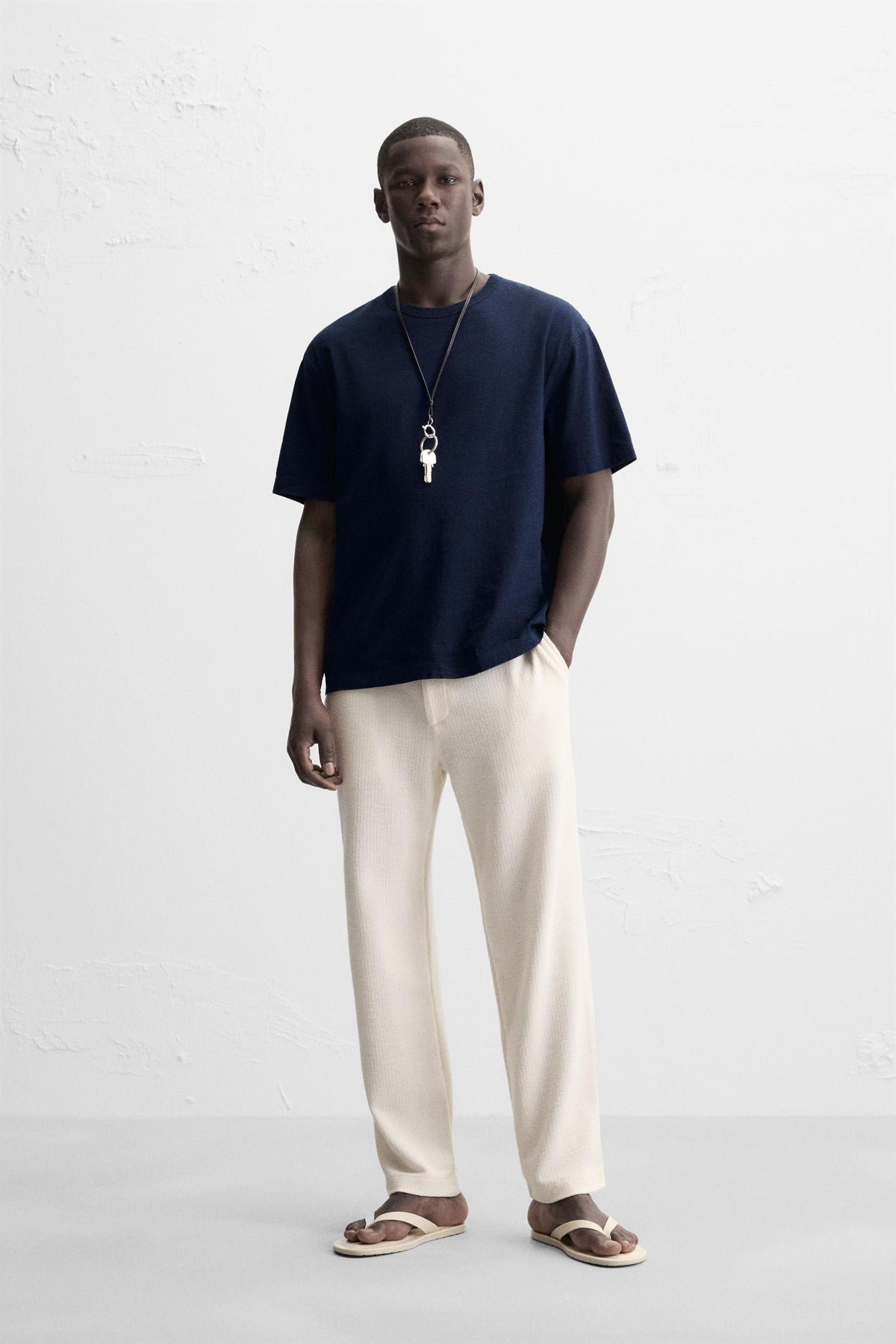 TEXTURED CHINO TROUSERS - Image 1