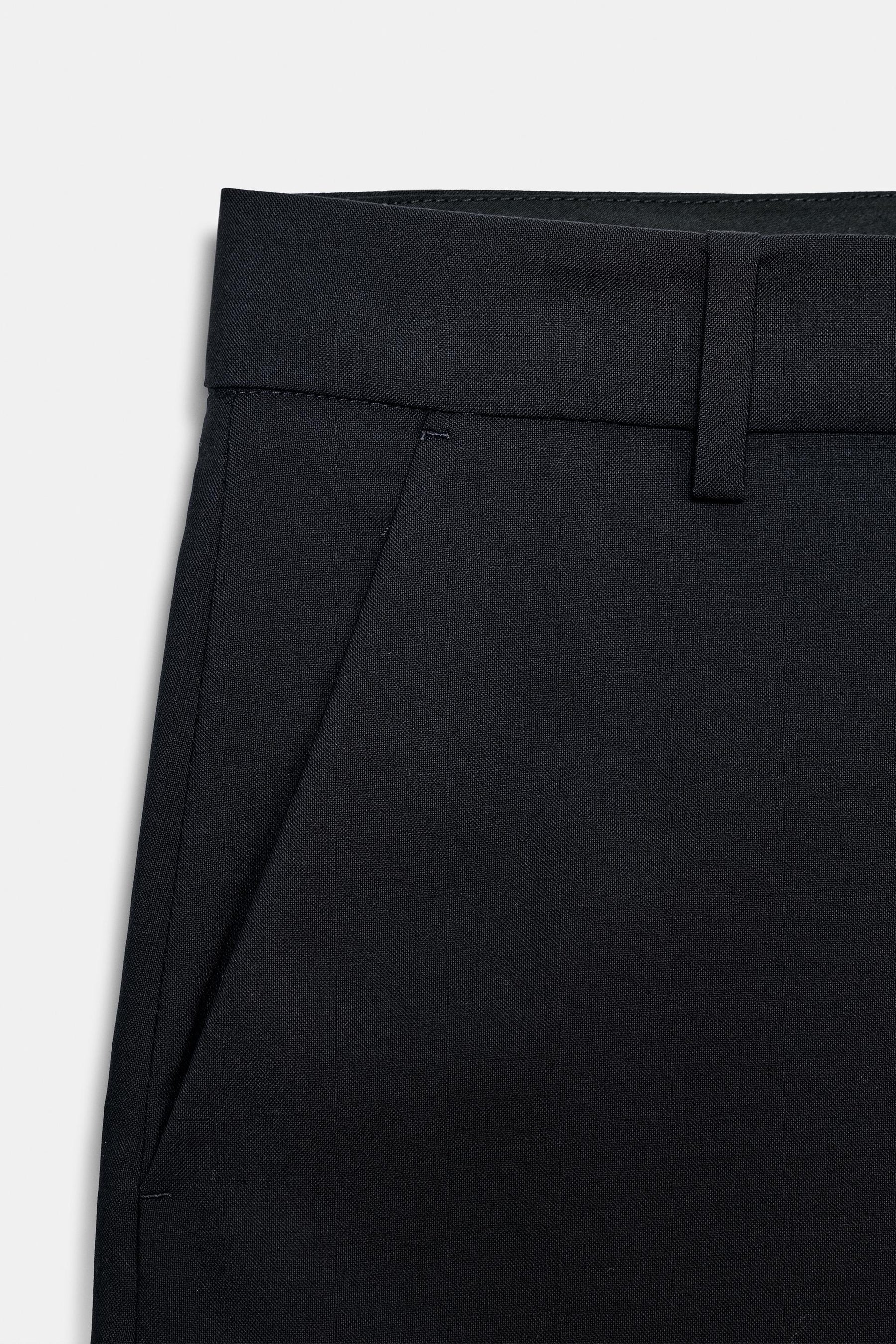 100% WOOL TROUSERS