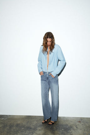 Cropped jeans with displaced