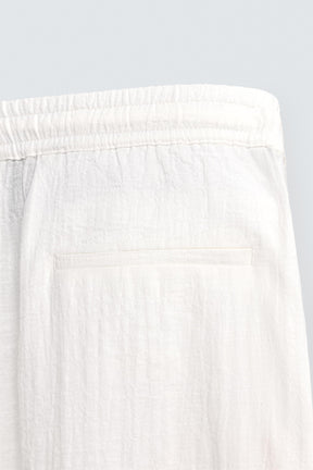 TEXTURED RELAXED FIT TROUSERS - Image 9