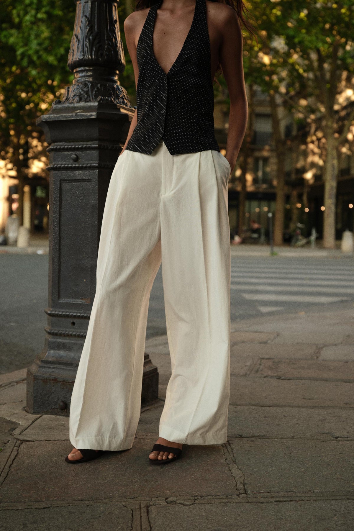 PLEATED TROUSERS WITH FLAPS