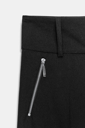 Trousers with zip pockets