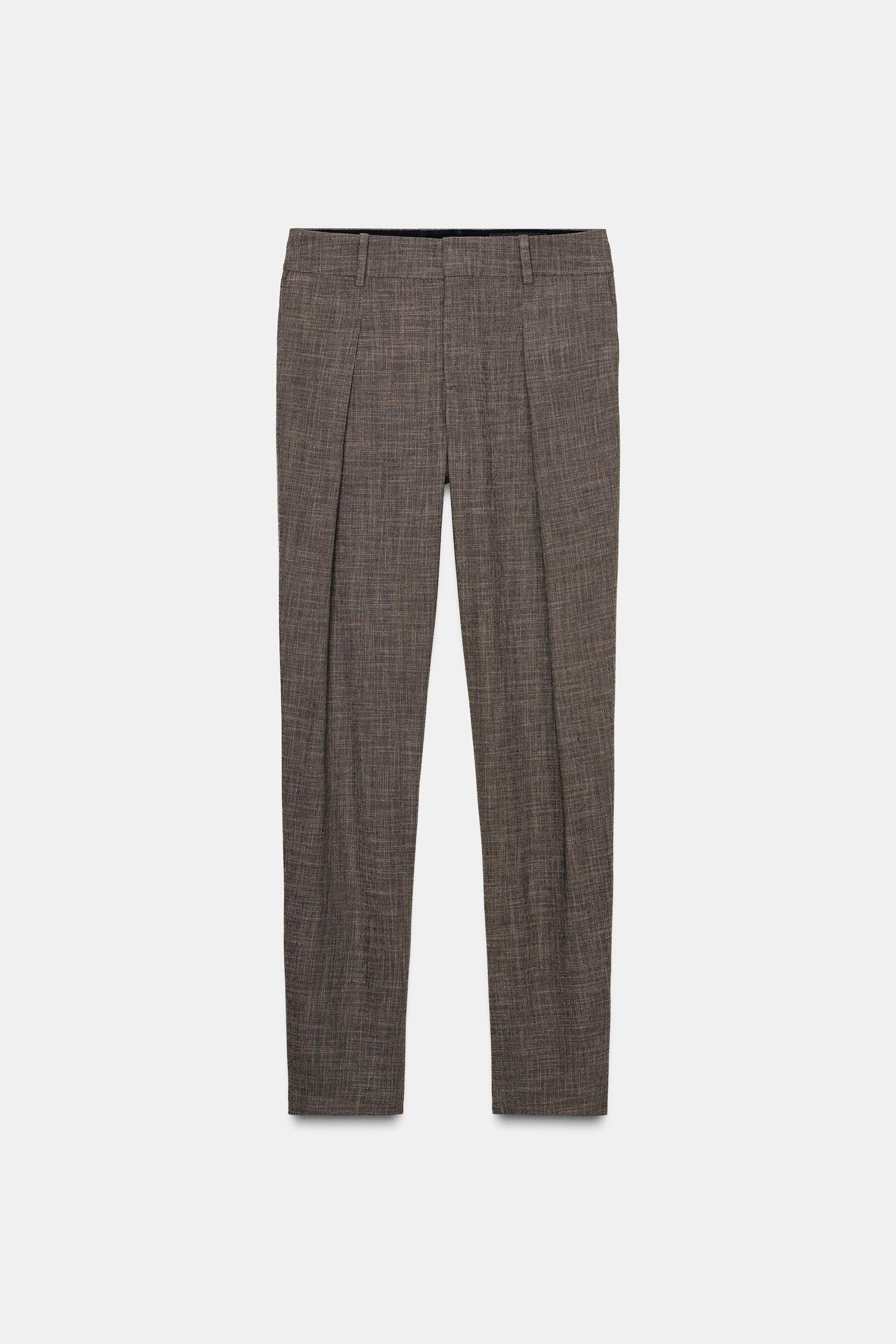 Trousers with button cuff