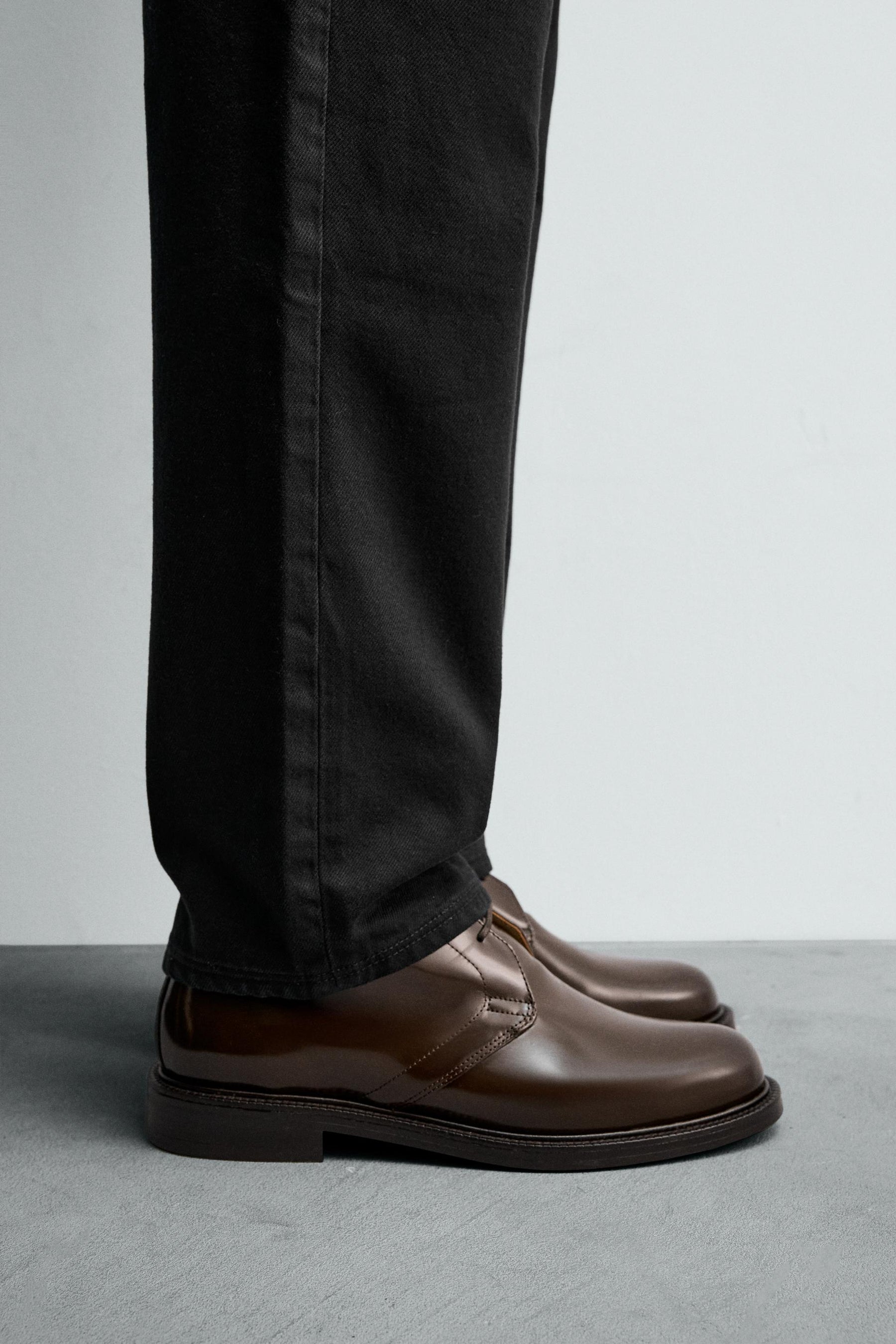 GLOSSY LEATHER BOOTS - Image 1